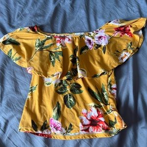Off the shoulder mustard color floral print blouse.